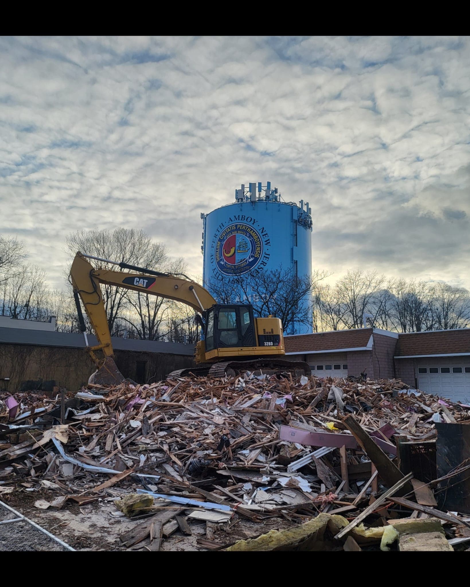 excavator working on a Perth Amboy area job site
